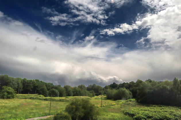 Backside thunderstorms in the city The sky over the Ruhr Valley during a weather situation with thunderstorm risk on the backside towards the east Essen North Rhine-Westphalia Germany