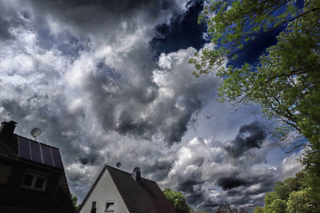 Severe thunderstorms in the city suburbs of Essen during a strong thunderstorm situation and ongoing warning with heavy rainfall from the southwest Essen North Rhine-Westphalia Germany