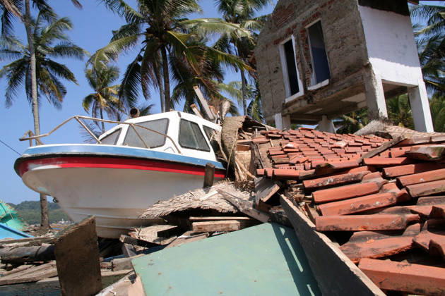 Over 500 Dead in Java Tsunami Jul 20, 2006; Ciamis, West Java, INDONESIA; A speedboat stranded on Pangandaran Beach. A tsunami hit the coast of the Indonesian island of Java killing more than 550 people, leaving over 600 injured. Over 38,000 others have been displaced by the disaster. An earthquake around 240km beneath the ocean floor caused the giant black wave to sweep 300m inland, destroying homes, hotels and people. Mandatory Credit: Photo by Toto Santiko Budi JiwaFoto ZUMA Press. ( ) Copyright 2006 by JiwaFoto Ciamis West Java INDONESIA Copyright: xTotoxSantikoxBudix