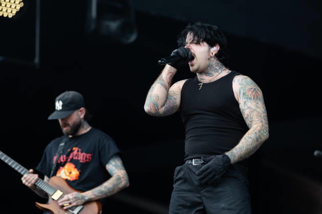 Daniel Winter Bates vocals and Ed Hartwell guitar In the background during the performance of the British metalcore band Bury Tomorrow as part of the Rock am Ring 2026 festival at the Nürburgring Nürburg Rock am Ring Rheinland Pfalz Germany