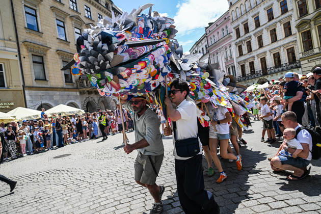 Poland s 25th Dragon Parade in Krakow KRAKOW, POLAND - JUNE 07: People take part the Dragon Parade during the 25th Great Dragon Parade edition at the Main Square, Krakow, Poland, on June 07, 2026. For the 25th year in a row, Krakow brings the annual celebration representing the myth of Dragon, the city symbol. Omar Marques Anadolu Krakow Poland. Editorial use only. Please get in touch for any other usage.  Copyright: x2026xAnadoluxOmarxMarquesx