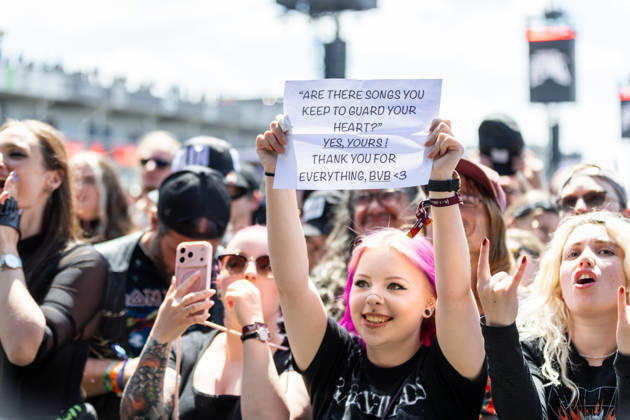 A fan holds a sign during the performance of the US rock band Black Veil Brides as part of the Rock am Ring 2026 festival at the Nürburgring The sign reads Are there Songs you keep to Guard your heart Yes, yours Thank you for everything, BVB and expresses the fans gratitude and personal connection to the band from Nürburg Rock am
