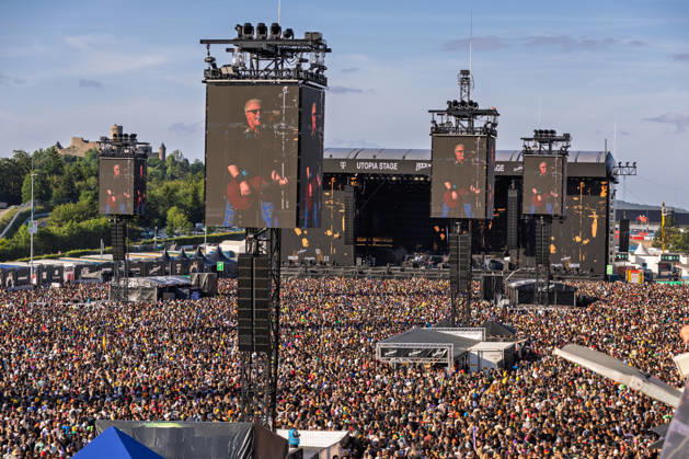 Rock am Ring 2026 Full infield 07 06 26 Tens of thousands of visitors stand in front of the Utopia Stage in the densely packed infield at Rock am Ring 2026 at the Nürburgring in Nürburg in the late afternoon The Utopia Stage, which is located in the paddock, is the largest of the three festival stages th Copyright: xMarcxJohnx