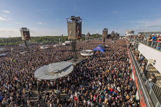 Rock am Ring 2026 Full infield 07 06 26 Tens of thousands of visitors stand in front of the Utopia Stage in the densely packed infield at Rock am Ring 2026 at the Nürburgring in Nürburg in the late afternoon The Utopia Stage, which is located in the paddock, is the largest of the three festival stages th Copyright: xMarcxJohnx