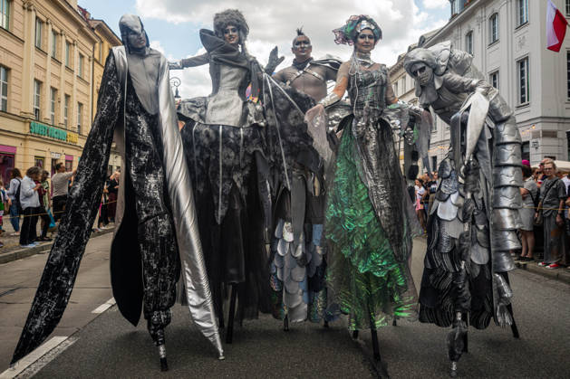 June 6, 2026, Warsaw, Mazovia, Poland: Performers on stilts pose for a photograph during the parade. Varsovians took to the streets to enjoy the 5th annual parade of the Mermaids. Celebrating the mermaid, the symbol of the city, the Warsaw districts came together to create a colourful procession of mermaids, bands, acrobats, dancers, and other performers, which moves from the Charles De Gaulle roundabout along the Royal Route to Castle Square. Warsaw Poland - ZUMAs197 20260606_aaa_s197_1103 Copyright: xNeilxMiltonx