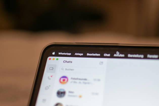 The logo of the messenger service WhatsApp on the display of a Macbook laptop WhatsApp is one of the worlds most widely used communication services for messages, voice and video calls Bad Wörishofen Bavaria Germany Copyright: xPhilippxMerkx