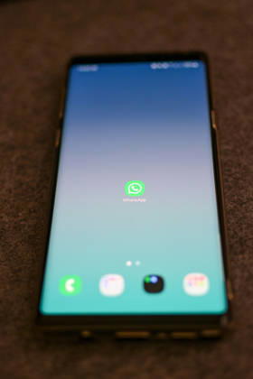The logo of the messenger service WhatsApp on the display of a smartphone WhatsApp is one of the worlds most widely used communication services for messages, voice and video calls Bad Wörishofen Bavaria Germany Copyright: xPhilippxMerkx
