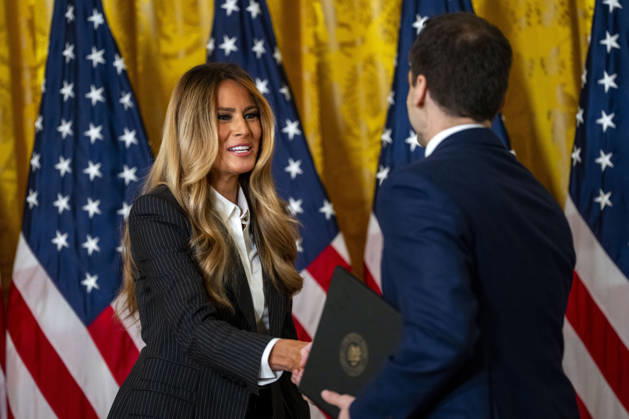 First Lady Melania Trump shakes hands with Director of the White House Office of Science and Technology Policy Michael Kratsios during an event honoring the winners of the Presidential AI Regional Challenge in the East Room of the White House in Washington, DC on Tuesday, June 9, 2026. The challenge recognizes both student and educator teams who designed AI-based solutions for community challenges. WAP20260609383 BONNIExCASH