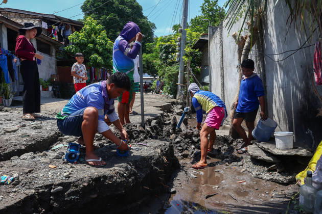Nearly 88,000 affected by 7.8-magnitude quake, 22,690 remain displaced in Southern Philippines GENERAL SANTOS, PHILIPPINES – JUNE 10: Residents work to repair water supply systems on a cracked road following a deadly earthquake in General Santos, Philippines, on June 10, 2026. Nearly 88,000 people across southern Mindanao have been affected by a magnitude 7.8 earthquake that struck southern Philippines on June 8, while more than 22,000 remain displaced as aftershocks continue, according to government and NGO figures. The quake has killed dozens of people, damaged infrastructure and homes, and caused residential buildings and poorly constructed houses to collapse, making it the strongest earthquake to hit the disaster-prone Southeast Asian c Copyright: x2026xAnadoluxDanielxCengx