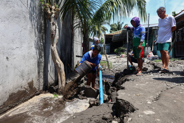 Nearly 88,000 affected by 7.8-magnitude quake, 22,690 remain displaced in Southern Philippines GENERAL SANTOS, PHILIPPINES – JUNE 10: Residents work to repair water supply systems on a cracked road following a deadly earthquake in General Santos, Philippines, on June 10, 2026. Nearly 88,000 people across southern Mindanao have been affected by a magnitude 7.8 earthquake that struck southern Philippines on June 8, while more than 22,000 remain displaced as aftershocks continue, according to government and NGO figures. The quake has killed dozens of people, damaged infrastructure and homes, and caused residential buildings and poorly constructed houses to collapse, making it the strongest earthquake to hit the disaster-prone Southeast Asian c Copyright: x2026xAnadoluxDanielxCengx