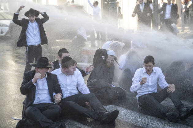 Police intervene as Ultra-Orthodox Jews block roads in West Jerusalem WEST JERUSALEM - JUNE 10: Israeli police use stun grenades and water cannons to disperse Ultra-Orthodox (Haredi) Jews blocking roads during a protest on June 10, 2026. Three demonstrators were detained during the incidents in West Jerusalem, where crowds gathered to protest against compulsory military service. Mostafa Alkharouf Anadolu Jerusalem Israel. Editorial use only. Please get in touch for any other usage.  Copyright: x2026xAnadoluxMostafaxAlkharoufx