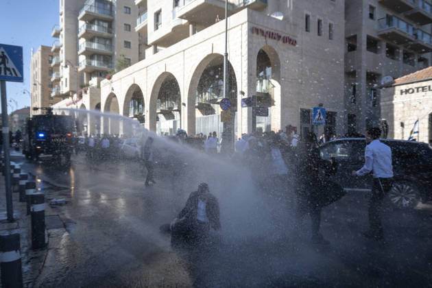 Police intervene as Ultra-Orthodox Jews block roads in West Jerusalem WEST JERUSALEM - JUNE 10: Israeli police use stun grenades and water cannons to disperse Ultra-Orthodox (Haredi) Jews blocking roads during a protest on June 10, 2026. Three demonstrators were detained during the incidents in West Jerusalem, where crowds gathered to protest against compulsory military service. Mostafa Alkharouf Anadolu Jerusalem Israel. Editorial use only. Please get in touch for any other usage.  Copyright: x2026xAnadoluxMostafaxAlkharoufx