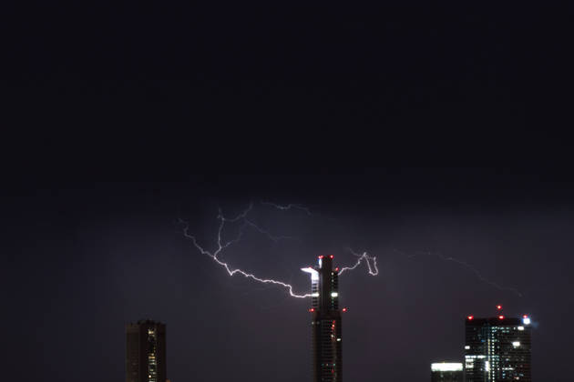 June 10, 2026, Frankfurt, Hesse, Germany: Lightning strikes behind part of the financial district skyline during a thunderstorm in Frankfurt am Main, Germany. Frankfurt Germany - ZUMAb332 20260610_zip_b332_014 Copyright: xMatiasxBasualdox