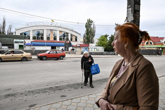RECORD DATE NOT STATED A woman crosses a street in the red zone of the frontline city of Kherson, the area considered the most dangerous due to constant Russian attacks, Kherson, Ukraine, on June 3, 2026. The Russian army attacks the city daily with FPV drones and other unmanned aerial vehicles, deliberately terrorizing civilians. Russian forces conduct hunts for local residents, tracking them with FPV drones and dropping explosives. Police officers, medics, public transport, and urban infrastructure are also targeted. Based on the intensity of attacks, Kherson is informally divided into yellow and red zones, with the red zone subjected to continuous shelling and drone strikes (Photo by Dmytro Smolienko Ukrinform) Life under shelling in frontline Kherso Copyright: xDmytroxSmolienkox