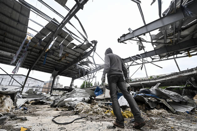 RECORD DATE NOT STATED A worker clears debris at the site of the Favoryt Arena ice sports palace, destroyed in Russian guided aerial bomb (KAB) strikes, in the frontline city of Kherson, Ukraine, on June 3, 2026. The Russian army attacks the city daily with FPV drones and other unmanned aerial vehicles, deliberately terrorizing civilians. Russian forces conduct hunts for local residents, tracking them with FPV drones and _drop_ping explosives. Police officers, medics, public transport, and urban infrastructure are also targeted (Photo by Dmytro Smolienko Ukrinform) Life under shelling in frontline Kherson Copyright: xDmytroxSmolienkox