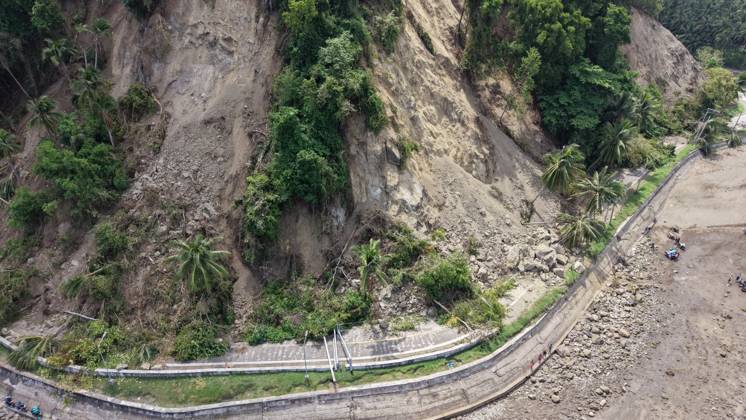 (260611) -- GENERAL SANTOS CITY, June 11, 2026 -- This photo taken on June 11, 2026 shows a blocked road after a major landslide triggered by an earthquake, in Sarangani Province, the Philippines. At least 47 people were killed, 31 missing and 688 injured after a magnitude 7.8 earthquake struck off the southern coast of Mindanao, the Philippines, on Monday, said the National Disaster Risk Reduction and Management Council (NDRRMC) on Thursday. (Str Xinhua) PHILIPPINES-SARANGANI PROVINCE-EARTHQUAKE-AFTERMATH RouellexUmali 