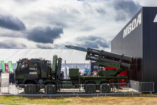 Trade visitor day at ILA Berlin 2026, Berlin, 12 06 2026 Exhibition of a mobile multiple rocket launcher MARS 3 from the manufacturer KNDS on a trade fair site MBDA Joint Fire Support Missile guided missiles are mounted on the vehicle Visitors view the exhibit at the MBDA Schöneberg Berlin ExpoCenter Airport Brandenburg Germany stand 20260612-286A9528-M4000