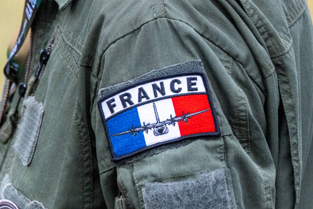 Trade visitor day at ILA Berlin 2026, Berlin, 12 06 2026 Close-up of an embroidered sleeve patch on an olive green pilot overall The patch shows the French tricolor with the inscription FRANCE and a silhouette of a C 130 transport aircraft License plate of the German-French C 130 fleet Schöneberg Berlin ExpoCenter Airport Brandenburg Germany 20260612-1V9A2235-M4000