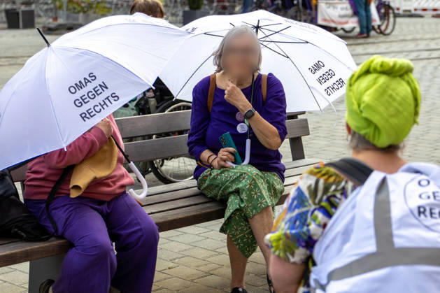 Augsburg, Bavaria, Germany June 13, 2026: Christopher Street Day (CSD) in Augsburg. The parade through the city center promotes the rights of LGBTQ+ people as well as social diversity and tolerance. On the sidelines of the event, Grandmas Against the Right with white umbrellas
