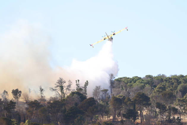 Firefighters response to wildfires in two regions in southern Italy SICILY, ITALY - JUNE 13: Two Canadair aircraft and three helicopters take part in an extinguishing work after a large fire has broken out in Montagna Grande, a town in Salemi, near Trapani in Sicily, Italy on June 13, 2026. Alberto Lo Bianco Anadolu Sicily Italy. Editorial use only. Please get in touch for any other usage.  Copyright: x2026xAnadoluxAlbertoxLoxBiancox