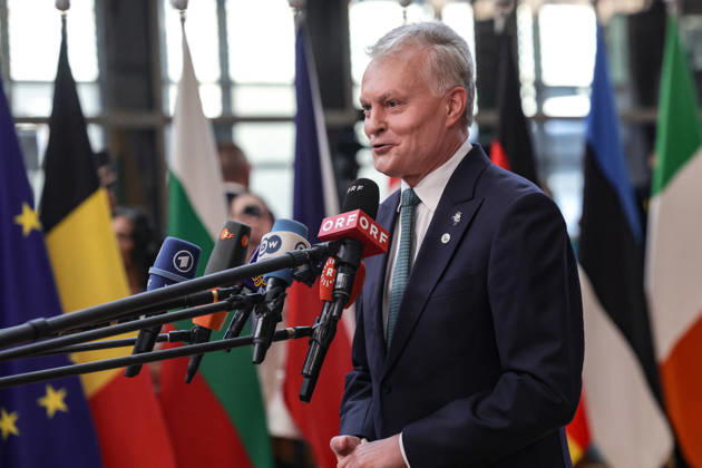 June 18, 2026, Brussels, Belgium, European Union: GITANAS NAUSEDA, President of the Republic of Lithuania, walks out to greet the press ahead of a roundtable meeting during the first night of the European Council Summit in Brussels. Lithuania is expected to emphasise continued support for Ukraine, stronger pressure on Russia and greater European defence readiness, including security along the EUÃ¢â‚¬â ¢s eastern flank. Brussels European Union - ZUMAo116 20260618_znp_o116_062 Copyright: xBiancaxOterox