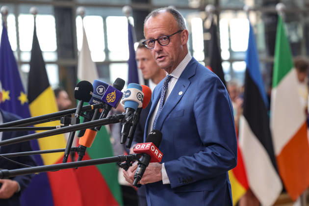 June 18, 2026, Brussels, Belgium, European Union: FRIEDRICH MERZ, Chancellor of Germany, walks out to greet the press ahead of a roundtable meeting during the first night of the European Council Summit in Brussels. Germany is expected to focus on competitiveness, defence readiness, migration, economic security and the blocâ€⠢s next long-term budget, alongside wider discussions on Ukraine and the Middle East. Brussels European Union - ZUMAo116 20260618_znp_o116_065 Copyright: xBiancaxOterox