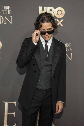 ABB HBO Harry Collett, wearing sunglasses, walked the red carpet at the German premiere of the third season of the HBO Original series House of the Dragon at Kino International on June 19, 2026, in Berlin, Germany,detected_source_language