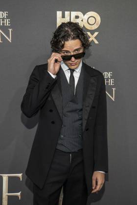 ABB HBO Harry Collett, wearing sunglasses, walked the red carpet at the German premiere of the third season of the HBO Original series House of the Dragon at Kino International on June 19, 2026, in Berlin, Germany,detected_source_language