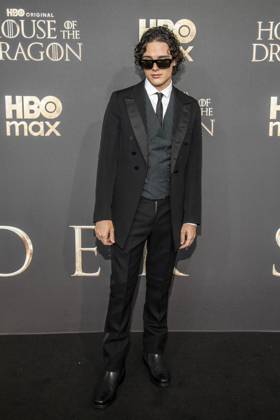 ABB HBO Harry Collett, wearing sunglasses, walked the red carpet at the German premiere of the third season of the HBO Original series House of the Dragon at Kino International on June 19, 2026, in Berlin, Germany,detected_source_language