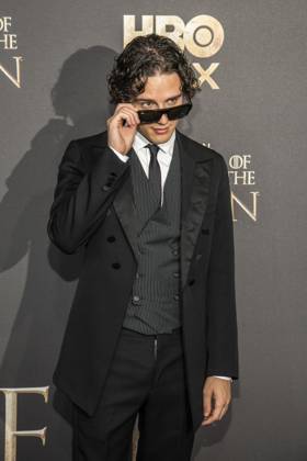 ABB HBO Harry Collett, wearing sunglasses, walked the red carpet at the German premiere of the third season of the HBO Original series House of the Dragon at Kino International on June 19, 2026, in Berlin, Germany,detected_source_language
