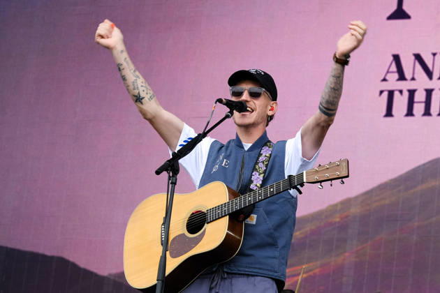 June 20, 2026, Newport, United Kingdom: Scottish singer songwriter Nathan Evans born Nathan Alexander Evans, performing live on stage with The Saint PHNX Band at the Isle of Wight festival. He first gained fame in 2020 by posting videos of himself singing sea shanties on TikTok. In 2021, he released a version of the folk song Wellerman which peaked at the top of the UK Singles Chart. The Saint PHNX Band is currently Nathan Evans Lead vocals and acoustic guitar., Stevie Jukes Lead vocals, guitar, and bass, Alan Jukes Backing vocals, drums, and percussion Newport United Kingdom - ZUMAs197 20260620_aaa_s197_146 Copyright: xDawnxFletcher-Parkx