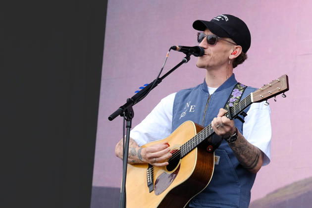 June 20, 2026, Newport, United Kingdom: Scottish singer songwriter Nathan Evans born Nathan Alexander Evans, performing live on stage with The Saint PHNX Band at the Isle of Wight festival. He first gained fame in 2020 by posting videos of himself singing sea shanties on TikTok. In 2021, he released a version of the folk song Wellerman which peaked at the top of the UK Singles Chart. The Saint PHNX Band is currently Nathan Evans Lead vocals and acoustic guitar., Stevie Jukes Lead vocals, guitar, and bass, Alan Jukes Backing vocals, drums, and percussion Newport United Kingdom - ZUMAs197 20260620_aaa_s197_156 Copyright: xDawnxFletcher-Parkx