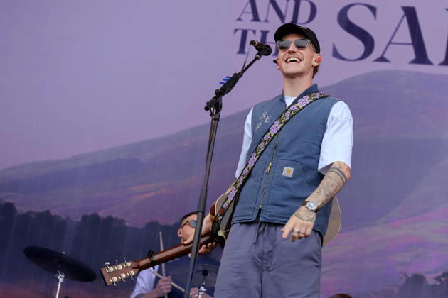 June 20, 2026, Newport, United Kingdom: Scottish singer songwriter Nathan Evans born Nathan Alexander Evans, performing live on stage with The Saint PHNX Band at the Isle of Wight festival. He first gained fame in 2020 by posting videos of himself singing sea shanties on TikTok. In 2021, he released a version of the folk song Wellerman which peaked at the top of the UK Singles Chart. The Saint PHNX Band is currently Nathan Evans Lead vocals and acoustic guitar., Stevie Jukes Lead vocals, guitar, and bass, Alan Jukes Backing vocals, drums, and percussion Newport United Kingdom - ZUMAs197 20260620_aaa_s197_157 Copyright: xDawnxFletcher-Parkx