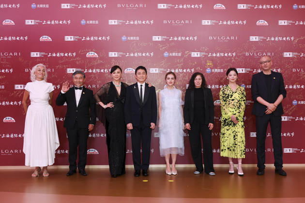 SHANGHAI, CHINA - JUNE 20: Jury members actor Tony Leung Chiu-wai and his wife Carina Lau Kar-ling, producer Dora Bouchoucha Fourati, director Guan Hu, director Aktan Abdykalykov, director-screenwriter Dea Kulumbegashvili, screenwriter Fernanda Valadez and actress Xin Zhilei arrive at the red carpet of the closing ceremony for the 28th Shanghai International Film Festival on June 20, 2026 in Shanghai, China.  Copyright: xVCGx 111649394723