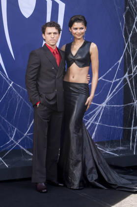 ABB SPIDER-MAN Tom Holland, a British actor, and his girlfriend, U.S. actress Zendaya, appeared on the black carpet at the German fan event for Spider-Man