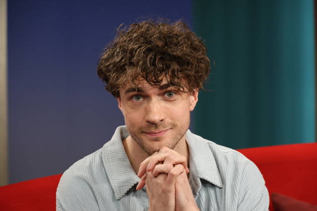 Timon Krause, mentalist, author, mind reader, and hypnotist, appeared as a guest on the television show *DAS Rote Sofa*, a live talk show produced by Norddeutscher Rundfunk (NDR); photo op on June 26, 2026, at the NDR television studio in Hamburg-Lokstedt