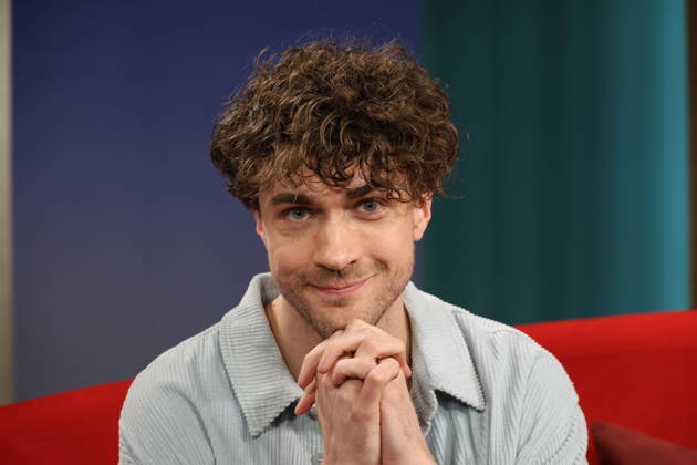 Timon Krause, mentalist, author, mind reader, and hypnotist, appeared as a guest on the television show *DAS Rote Sofa*, a live talk show produced by Norddeutscher Rundfunk (NDR); photo op on June 26, 2026, at the NDR television studio in Hamburg-Lokstedt