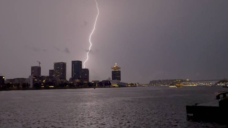 Amsterdam The Netherlands 26th June 2026 A spectacular electric storm passes over Het Ij waterway in the centre of the city making an end to the heatwave of the past week. het weer, weather, wetter, lightning, thunder, onweer,