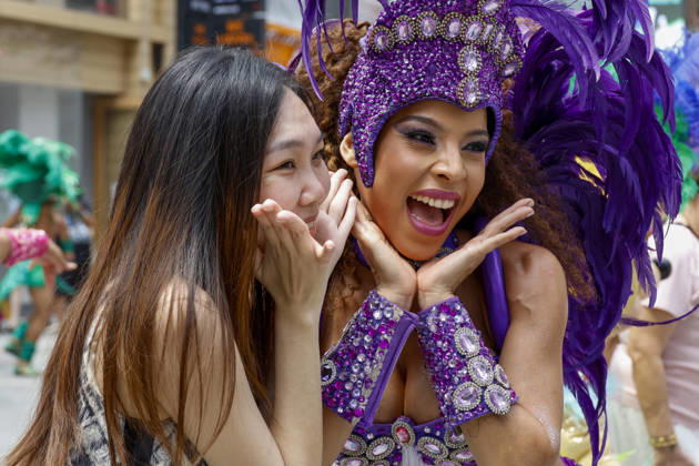 Dancers perform samba show summer festival in Seoul Dancers from Lotte World, a South Korean theme park, pose for photos with visitors after performing a samba show during a summer festival promotional event in the Myeongdong shopping district in Seoul, South Korea, on July 01, 2026. Seoul South Korea  Copyright: xMatrixxImagesx xJungxUi-Chelx
