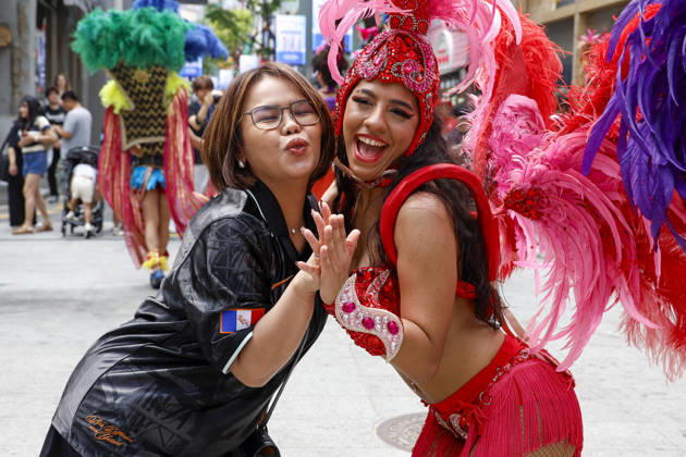 Dancers perform samba show summer festival in Seoul Dancers from Lotte World, a South Korean theme park, pose for photos with visitors after performing a samba show during a summer festival promotional event in the Myeongdong shopping district in Seoul, South Korea, on July 01, 2026. Seoul South Korea  Copyright: xMatrixxImagesx xJungxUi-Chelx