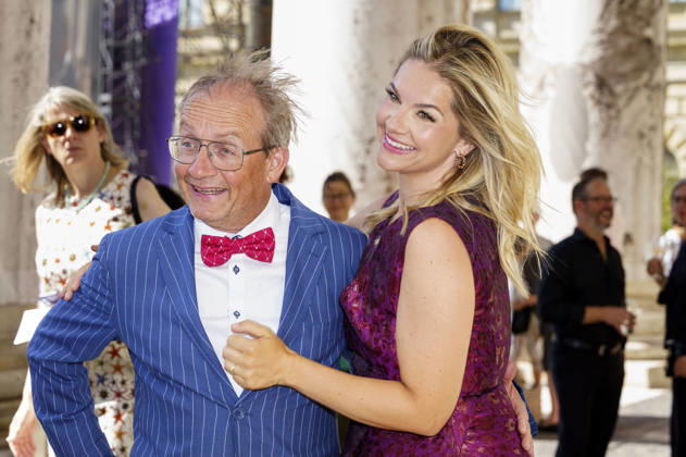 Wigald Boning with his wife, Teresa Boning, upon arrival at the Opera for All 2026 event, part of the Munich Opera Festival, featuring a live opera broadcast of Richard Wagner’s *Die Walküre* at the National Theater in Munich, July 4, 2026 Foto:xN.xKolinzx xFuturexImagex oper_6711