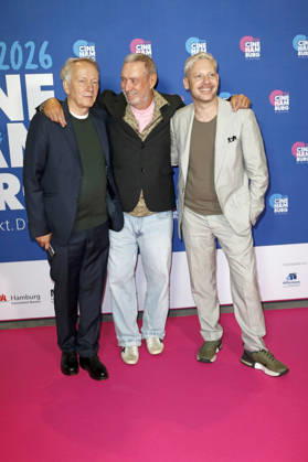 Thomas Wöbke, Roland Emmerich, and Marco Kreuzpaintner at the presentation of the Gläsernes Leinwand award to Roland Emmerich as part of CineHamburg 2026 at Cinemaxx Dammtor in Hamburg, July 7, 2026 Foto:xC.xTamckex xFuturexImagex emmerich_6726