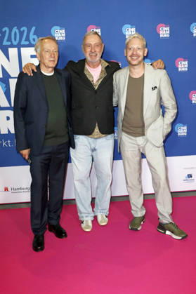 Thomas Wöbke, Roland Emmerich, and Marco Kreuzpaintner at the presentation of the Gläsernes Leinwand award to Roland Emmerich as part of CineHamburg 2026 at Cinemaxx Dammtor in Hamburg, July 7, 2026 Foto:xC.xTamckex xFuturexImagex emmerich_6727