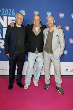 Thomas Wöbke, Roland Emmerich, and Marco Kreuzpaintner at the presentation of the Gläsernes Leinwand award to Roland Emmerich as part of CineHamburg 2026 at Cinemaxx Dammtor in Hamburg, July 7, 2026 Foto:xC.xTamckex xFuturexImagex emmerich_6728