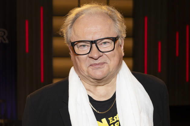 Singer and writer Heinz Rudolf KUNZE, friendly, smiling, wearing a white scarf, portrait, guest on the TV show Kölner Treff on WDR television, recorded on July 10, 2026, broadcast on August 7, 2026