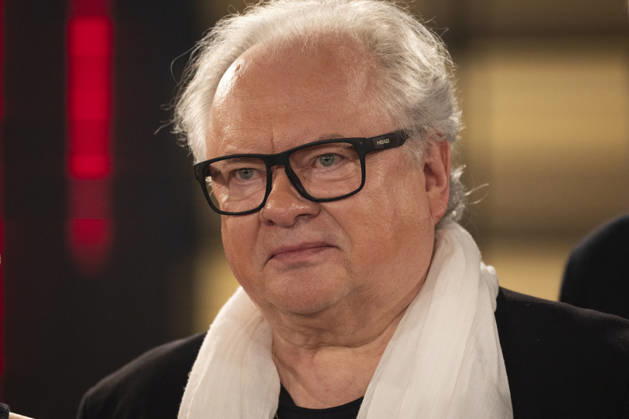 Singer and writer Heinz Rudolf KUNZE, looking pensive, wearing a white scarf, portrait, guest on the TV show Kölner Treff on WDR television, recorded on July 10, 2026, broadcast on August 7, 2026