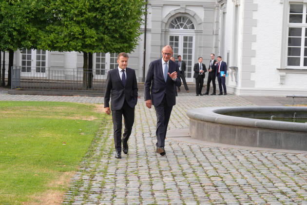 Visit by the French President to Federal Chancellor Merz in Bensberg Federal Chancellor Friedrich Merz walks with French President Emmanuel Macron through the hotel’s entrance area prior to the delegation meeting in the Salon Medici at the Schlosshotel Bensberg, Bensberg, July 16, 2026, Bensberg, North Rhine-Westphalia, Germany