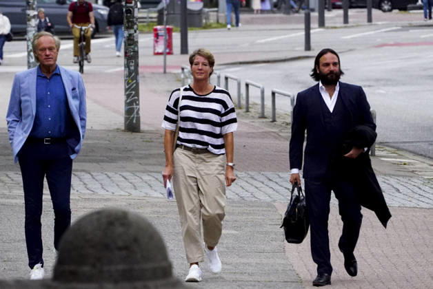 CNTV BLOCK Gerhard Delling, TV host; Christina Block, businesswoman, with her attorney Ingo Bott on their way to court on a street in Hamburg on July 28, 2026, for the trial regarding the alleged child abduction at the Hamburg Regional Court’s Criminal Justice Building—the Block children’s abduction case Hamburg, Germany
