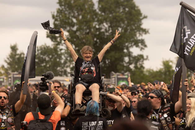 The 35th Wacken Open Air: Friday, Headliner Day, and Friday is Flyday, when people with disabilities—including those in wheelchairs—crowd-surfed. With temperatures that were almost mild, Friday at the Wacken Open Air once again broke all records. All day long, fans waited not only for Judas