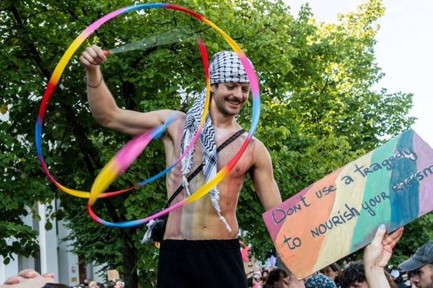 August 2, 2026, Berlin, Germany: BERLIN, Germany †August 2, 2026: Thousands of people gather at Neptunebrunnen under the slogan â€oeFrom Grief to Anger to Resistance†to condemn the recent attack at Berlin Pride. The peaceful march continued to the Brandenburg Gate with participants carrying banners, posters, and drums. Police arrested one suspect near the demonstration who was carrying a German flag and fireworks. Berlin Germany - ZUMAq101 20260802_zna_q101_187 Copyright: xAndro SxTrujillox